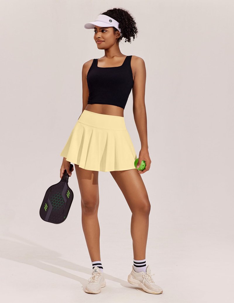PINSPARK Athletic Skirts for Women Pleated Tennis Skort with Pockets Mini Pickleball Skirt Stretchy Sports Skirts, Butter Yellow XXL