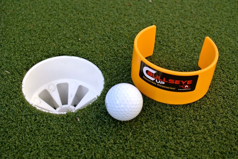 EyeLine Golf Bullseye Cup- Portable Aids to Improve Putting Accuracy. Reduce The Size of Cup to 2.5”. Create Cup Entry Point for Ball. Speed Control for Breaking Putts. Made in USA. Indoors/Outdoors