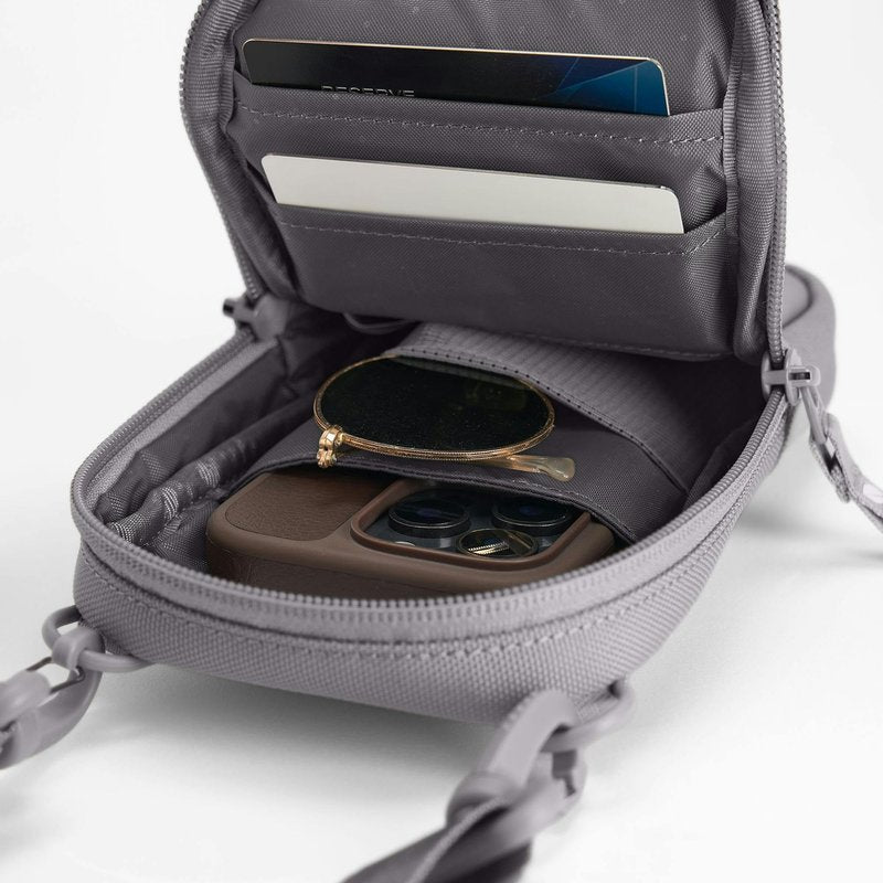 Incase A.R.C. Small Crossbody Bag, Recycled Polyester, Fits iPhone Pro Max, External Pocket, Adjustable Strap, Travel Sling (Grey)