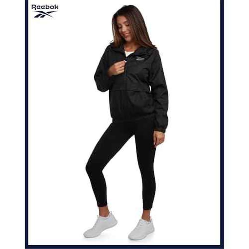 Reebok Womens Windbreaker Jacket - Lightweight Water and Wind Resistant Outdoor Hooded Rain Coat for Running (Sizes: S-XL)