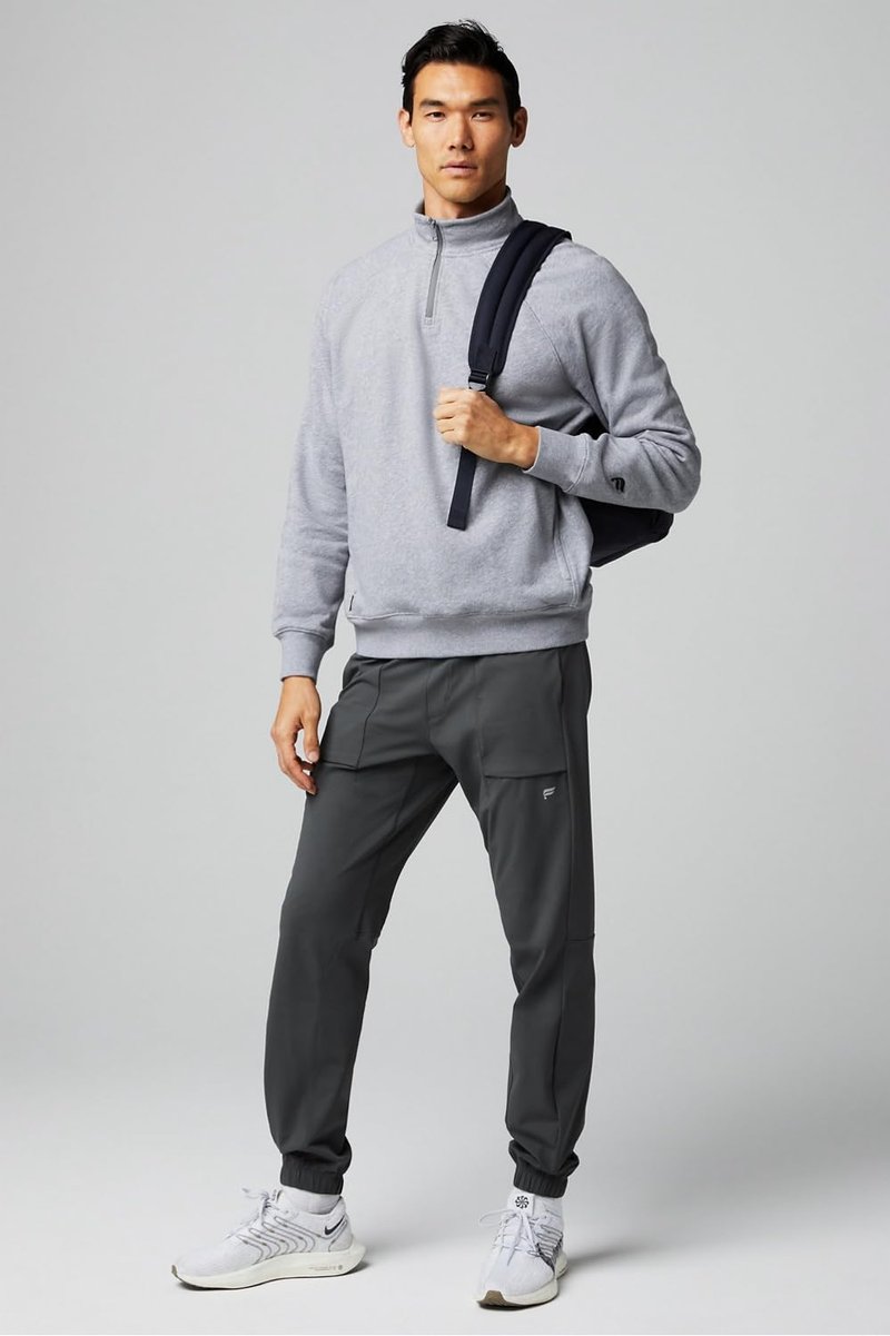 Fabletics Men's The One Jogger, Quick-Dry, Hidden Pockets, Zip Pockets, Anti-Stink, Lightweight, L/Regular 29 in | 29, Onyx