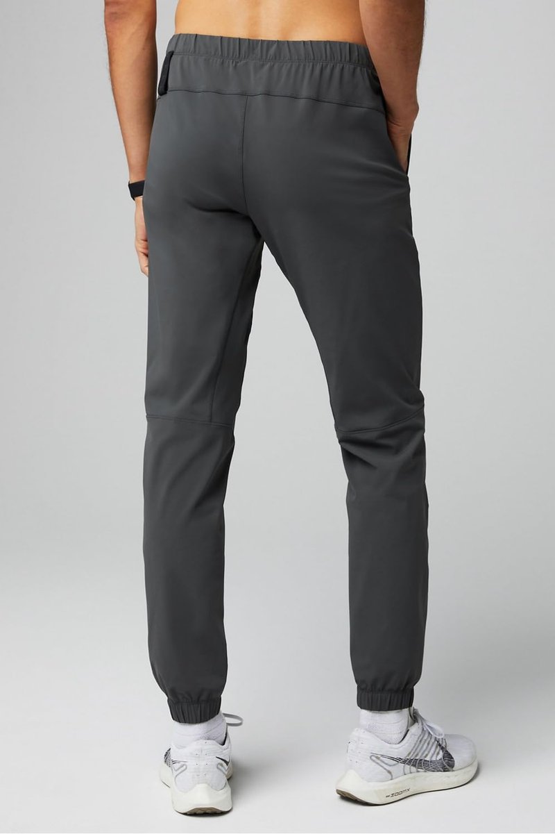 Fabletics Men's The One Jogger, Quick-Dry, Hidden Pockets, Zip Pockets, Anti-Stink, Lightweight, L/Regular 29 in | 29, Onyx