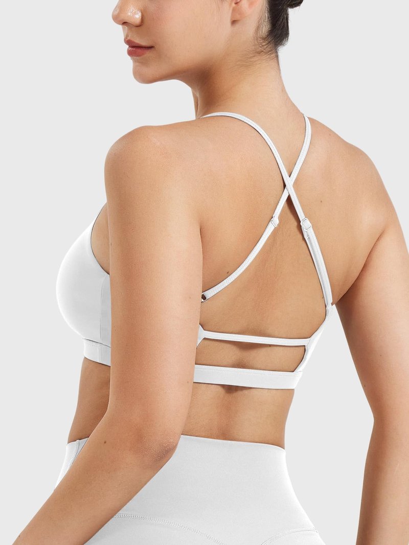YEOREO Women's Sports Bras Chilene Strappy Criss Cross Open Back Low Impact Removable Cups Gym Yoga Workout Bra White
