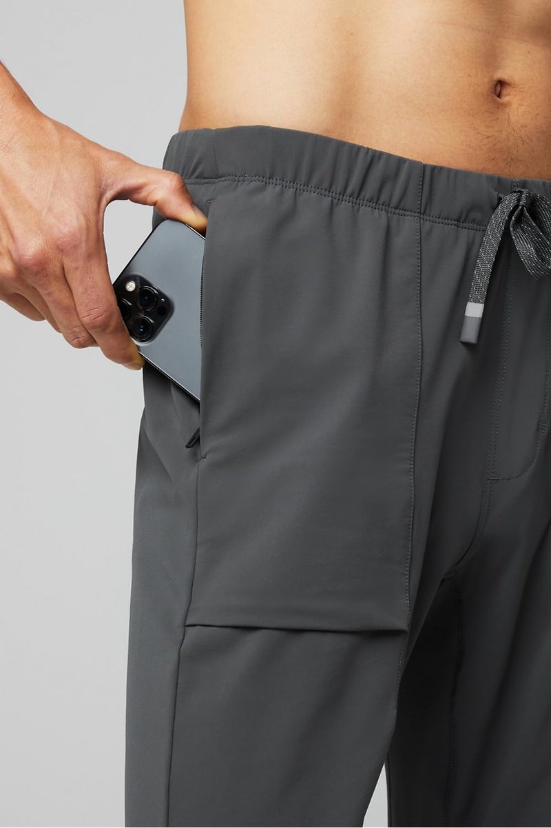 Fabletics Men's The One Jogger, Quick-Dry, Hidden Pockets, Zip Pockets, Anti-Stink, Lightweight, L/Regular 29 in | 29, Onyx