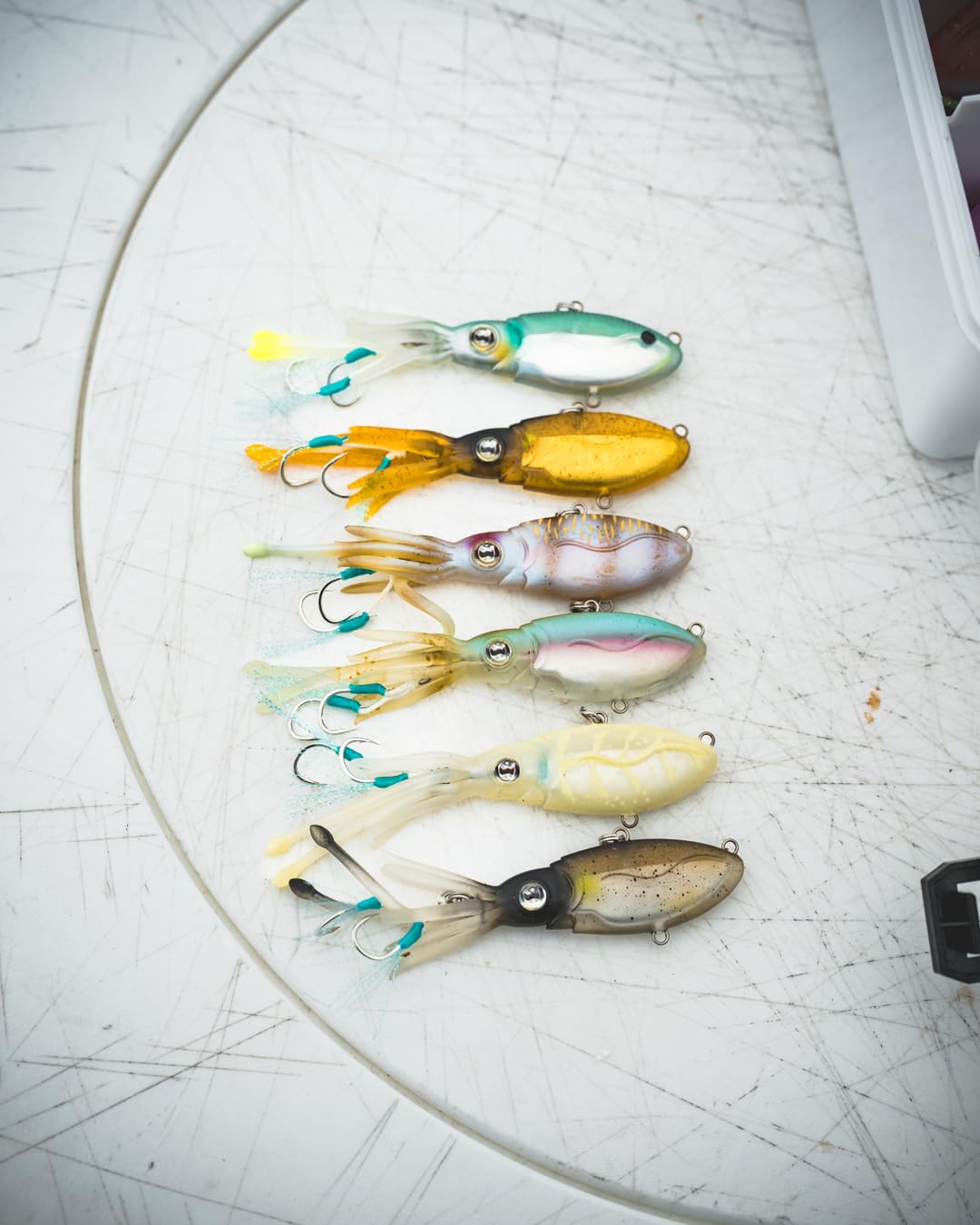 Nomad Design Squidtrex Patented Vibrating Fishing Lure- Scent Added TPE Soft Plastic Lure for Saltwater w/Strong BKK Assist Hooks, Fishing Bait that Catches Many Species- 55mm, 1/6oz Holo Ghost Shad