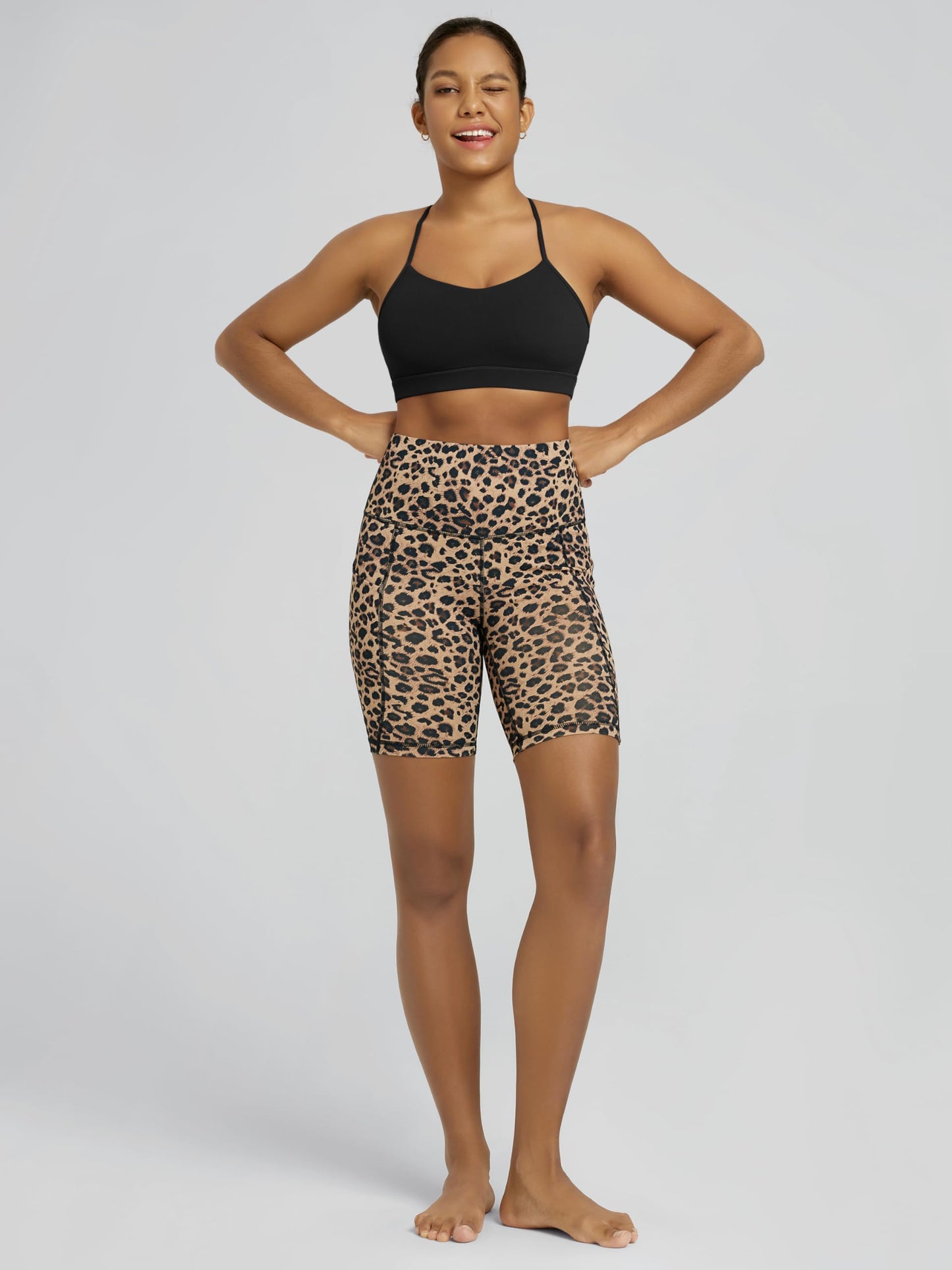 ODODOS 8" Tummy Control Biker Shorts for Women with Pockets High Waist Running Workout Athletic Yoga Shorts, Leopard, Large