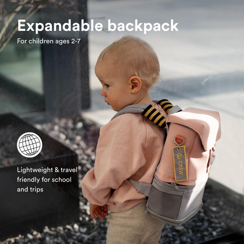 Stokke JetKids BackPack, Pink Lemonade - Expandable Design for Kids 2-7 Years Old - Easy-to-Clean, Water Repellent Fabric - Includes Pull-Out Seat Pad, Name Tag & Detachable Captain Stripes
