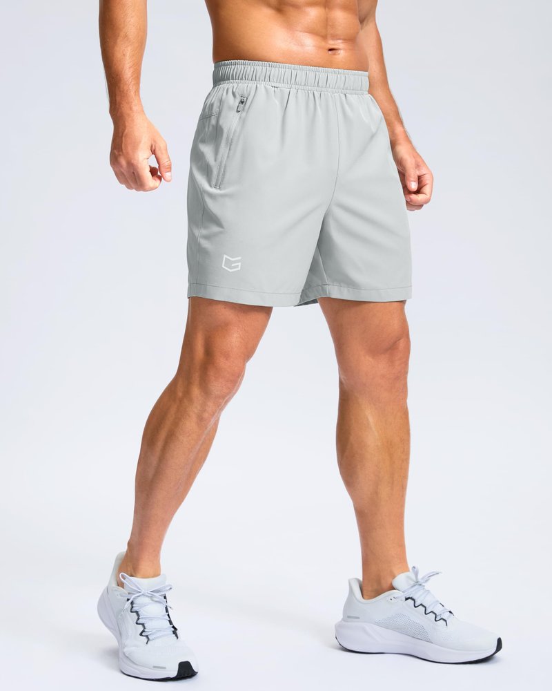 G Gradual Men's Athletic Running Shorts with Zipper Pockets Quick Dry 7"/ 5"/ 9" Workout Gym Shorts for Basketball Hiking(Platinum Grey,5XL)