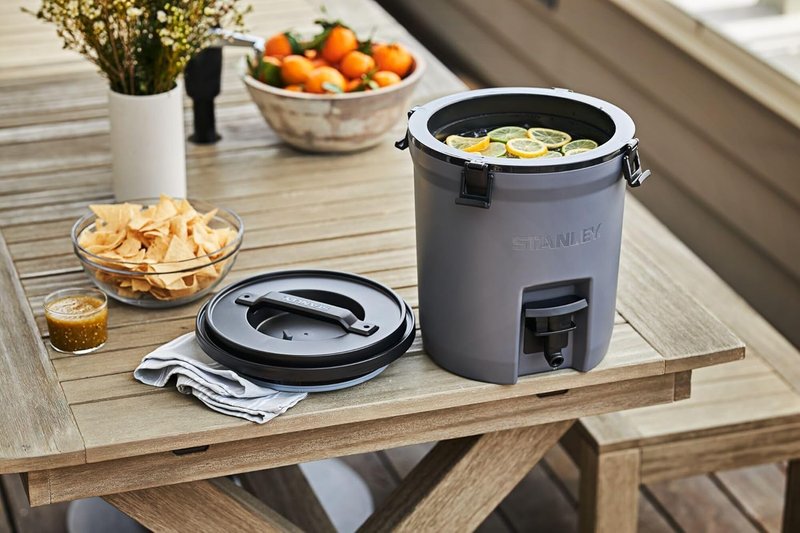 Stanley Adventure Fast Flow Water Jug 2 Gallon | Leakproof Ice Water Dispenser | Insulated Beverage Cooler | Easy Pour Spigot and Latched Foam Lid | BPA-Free | Twilight