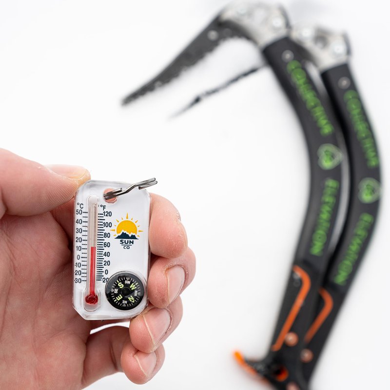 Sun Company Therm-o-Compass | Multi-Functional Zipper Pull Compass & Thermometer with Wind Chill Chart | Ideal for Camping, Hiking, and Outdoor Navigation