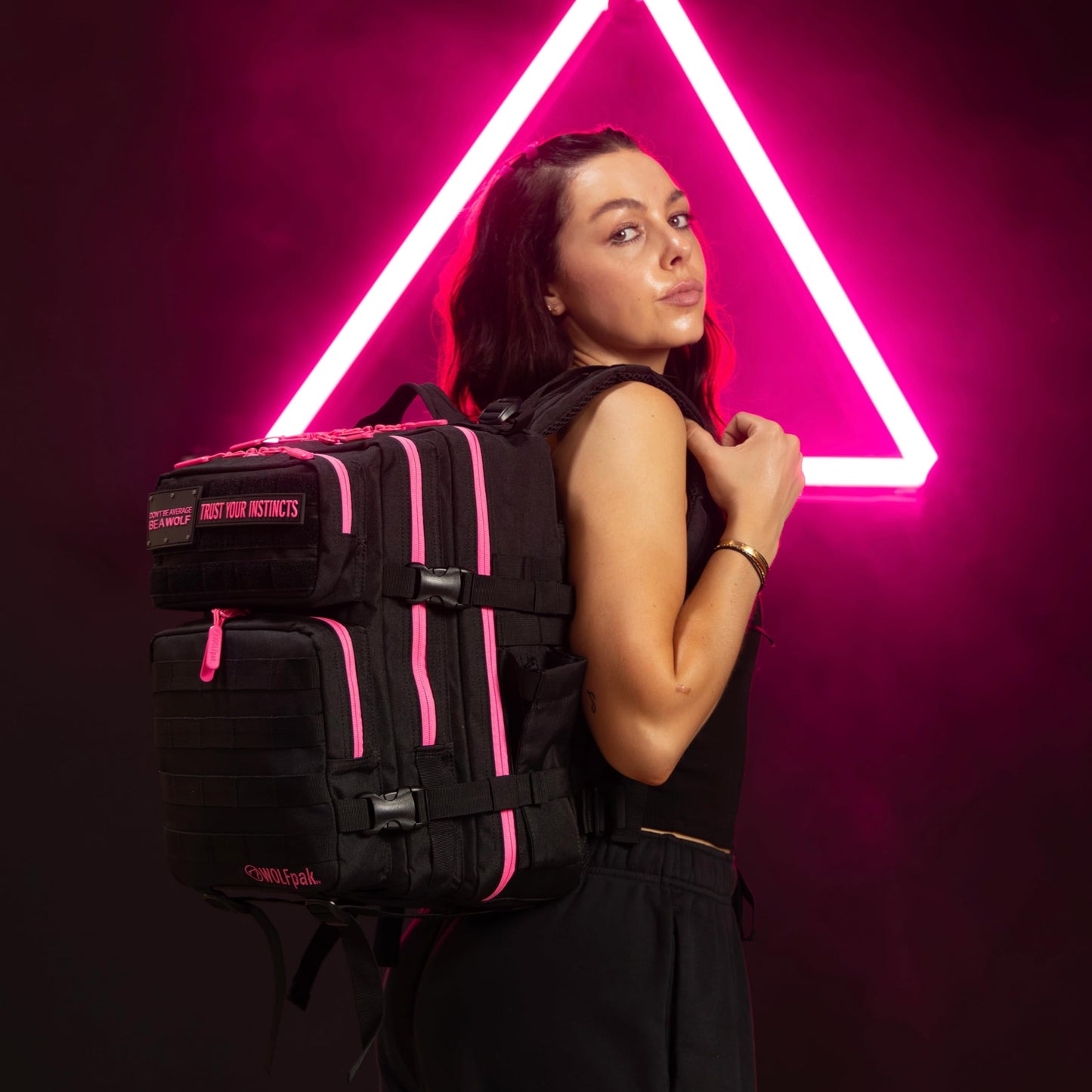 WOLFpak 25L Athletic Gym Backpack (Black Neon Pink) Durable 1000D Waterproof Oxford Material with MOLLE Webbing, Laptop Pocket & Dual Cup Holders