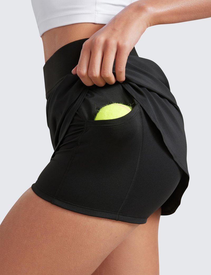 CRZ YOGA Dolphin Golf Skirts for Women A Line High Waisted Casual Athletic Mini Tennis Pickleball Skort with Zipper Pocket Black Medium