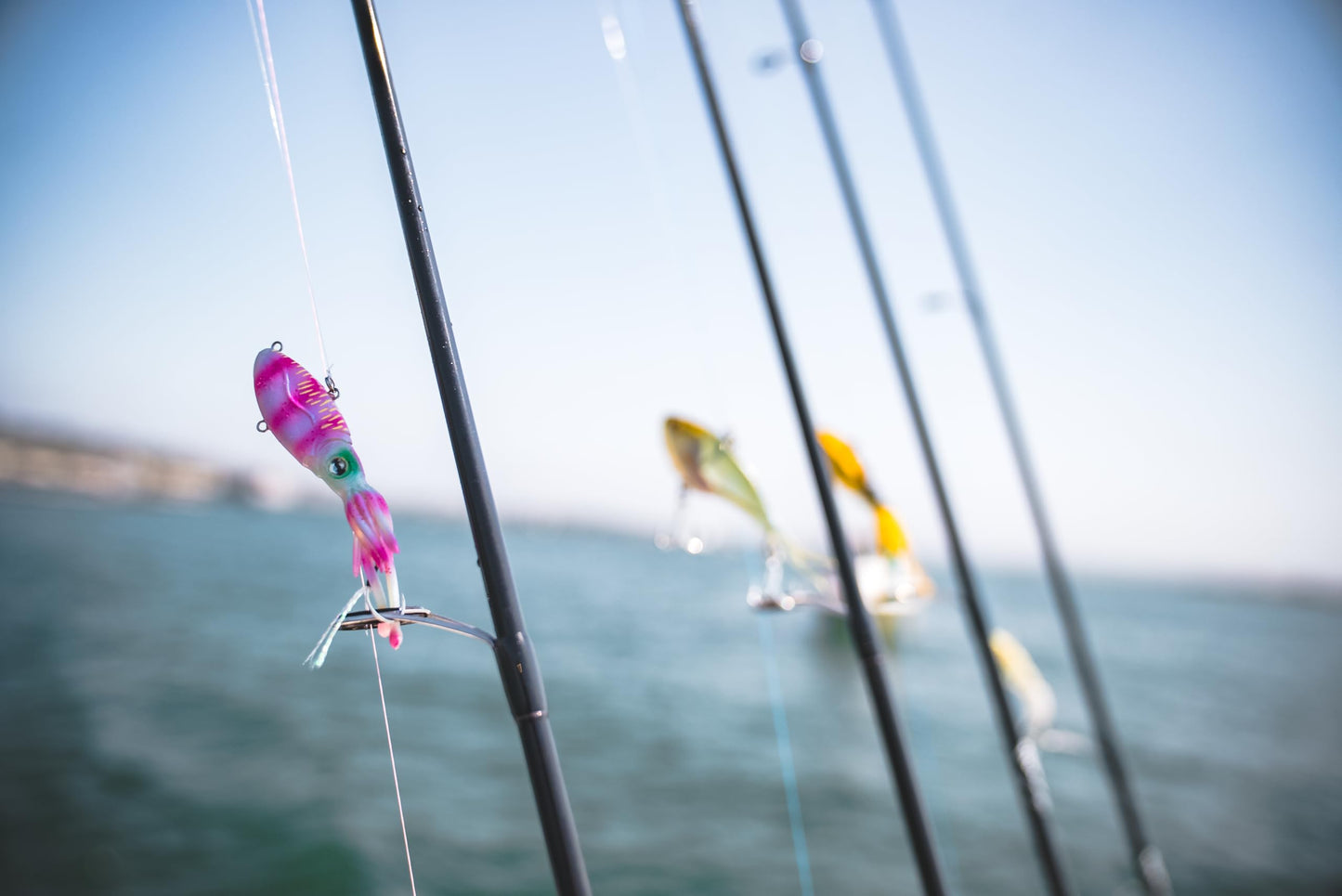 Nomad Design Squidtrex Patented Vibrating Fishing Lure- Scent Added TPE Soft Plastic Lure for Saltwater w/Strong BKK Assist Hooks, Fishing Bait that Catches Many Species- 55mm, 1/6oz Holo Ghost Shad