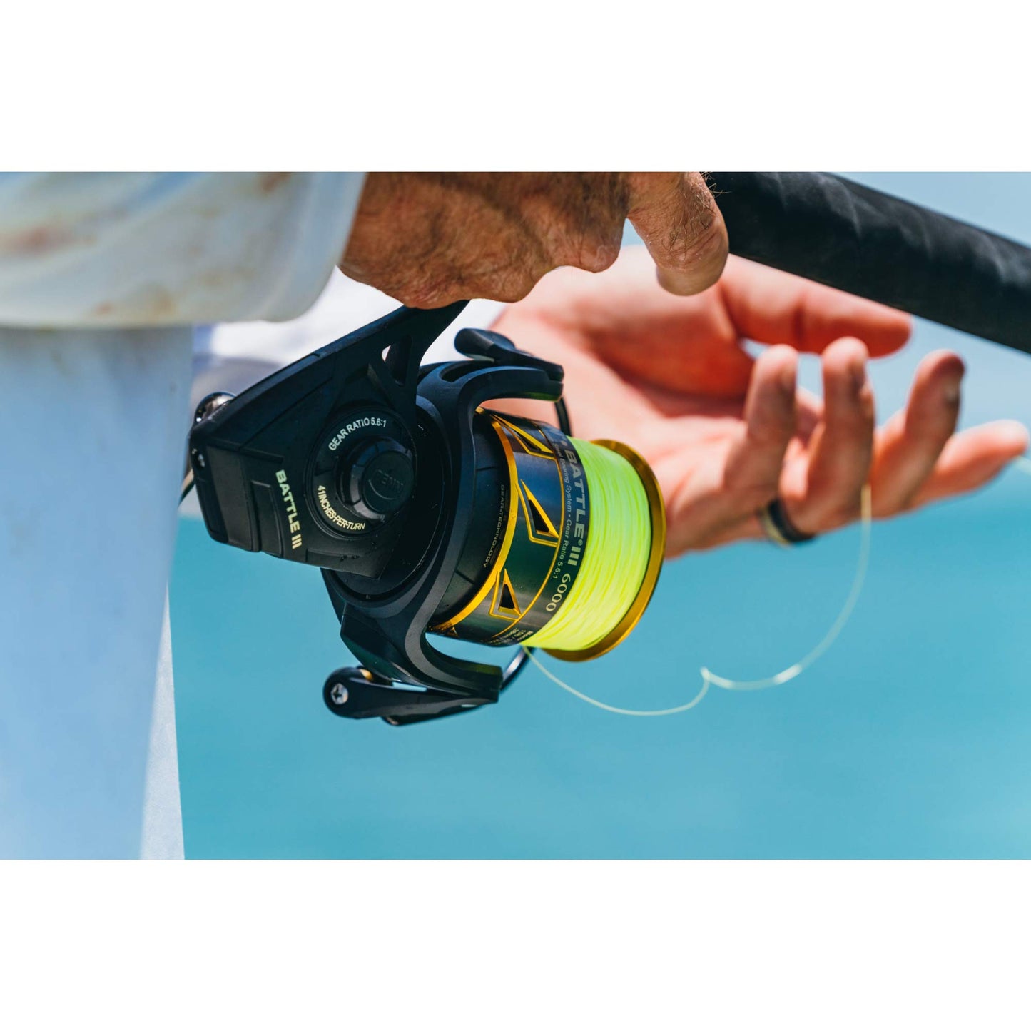 PENN Battle III Spinning Inshore Fishing Reel, HT-100 Front Drag, max of 15lb | 6.8kg, Made with Sturdy All-Aluminum Composition for Durability, 4000, black gold