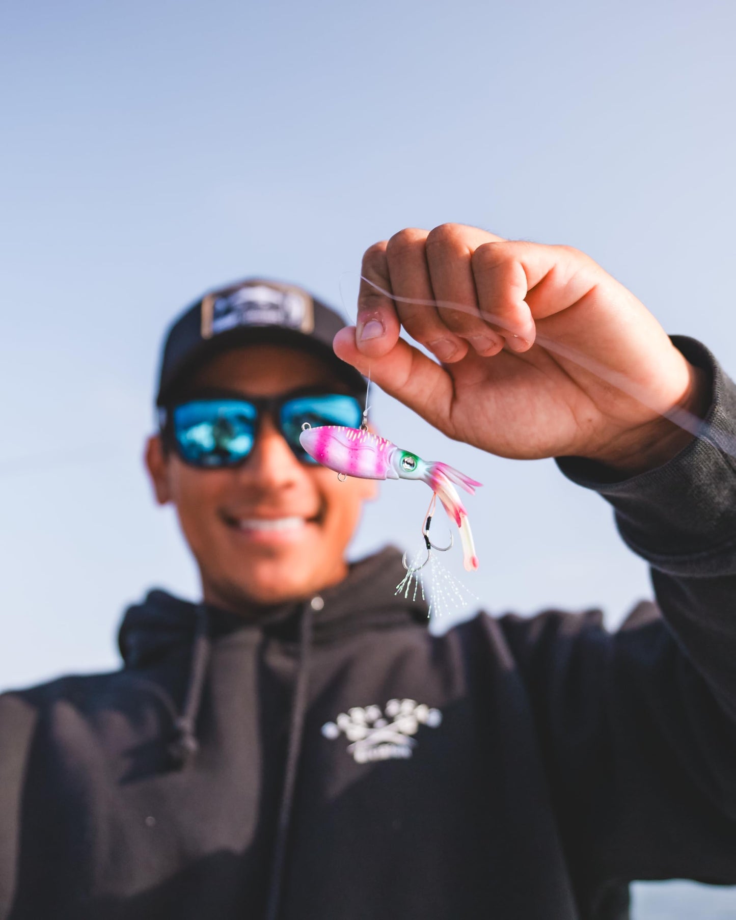 Nomad Design Squidtrex Patented Vibrating Fishing Lure- Scent Added TPE Soft Plastic Lure for Saltwater w/Strong BKK Assist Hooks, Fishing Bait that Catches Many Species- 55mm, 1/6oz Holo Ghost Shad