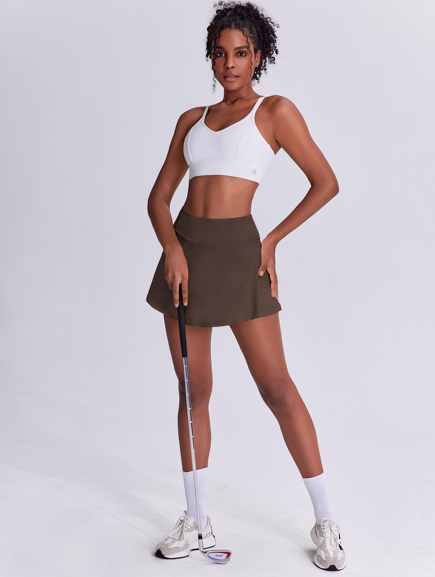 PINSPARK Tennis Skirts for Women Lightweight Golf Skirt with Pockets Stretchy Pickleball Skorts Quick Dry Athletic Skort Flowy Pleated Active Skirt, Espresso Brown Large