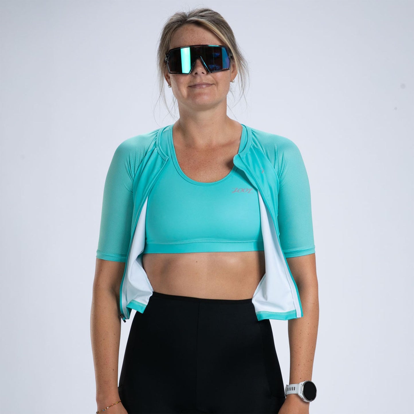 Zoot Women’s Core Tri Aero FZ Racesuit, Short Sleeve Moisture-Wicking Triathlon Suit, Plush Chamois & Race Day Storage - Aqua Blue - X-Small