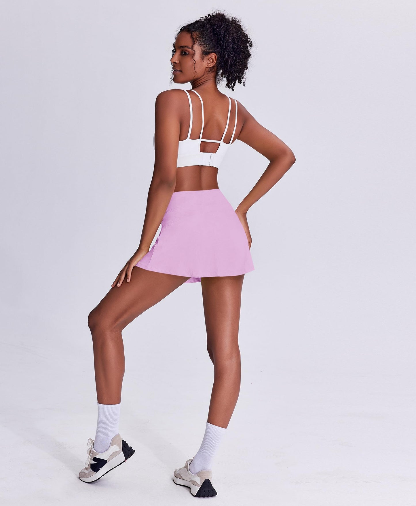 PINSPARK Tennis Skirts for Women UPF 50+ Golf Skirt Lightweight Athletic Skort with Pockets Flowy Pickleball Skorts, Light Pink Medium