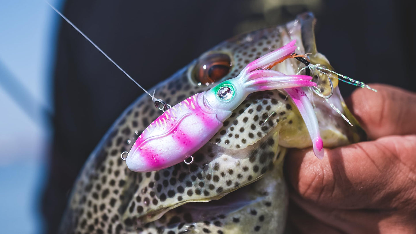 Nomad Design Squidtrex Patented Vibrating Fishing Lure- Scent Added TPE Soft Plastic Lure for Saltwater w/Strong BKK Assist Hooks, Fishing Bait that Catches Many Species, 75mm 1/2oz- Green Gold Gizzy