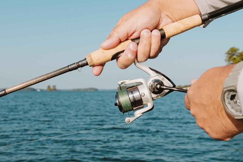 Pflueger 6'6" Trion Spinning Rod and Reel Combo, 2-Piece Graphite Rod, Size Front Drag Reel, Right/Left Handle Position, Lightweight and Corrosion-Resistant, Aluminum Spool, Front Drag System,Silver