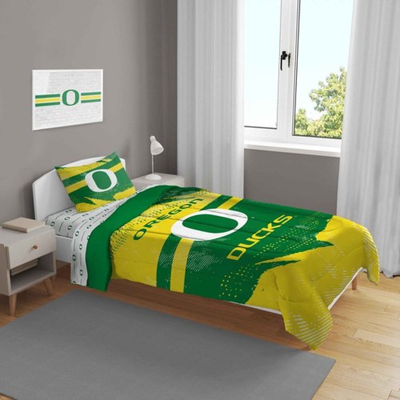 Pegasus Sports NCAA Oregon Ducks Slanted Stripe 4 PC Twin Bed in a Bag