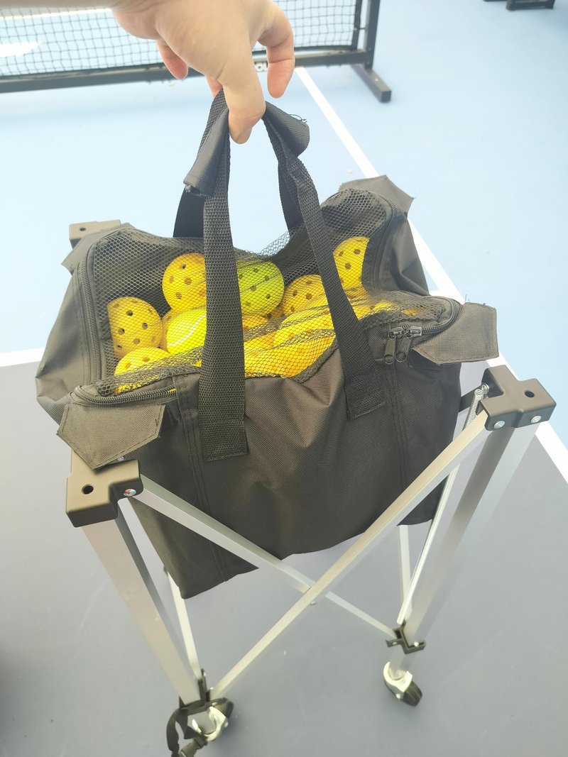 Portable tennis hopper for collecting products can hold 180 balls. The foldable tennis basket, pickleball basket, wheeled teaching vehicle, and the lightweight tennis ball carrier with wheels