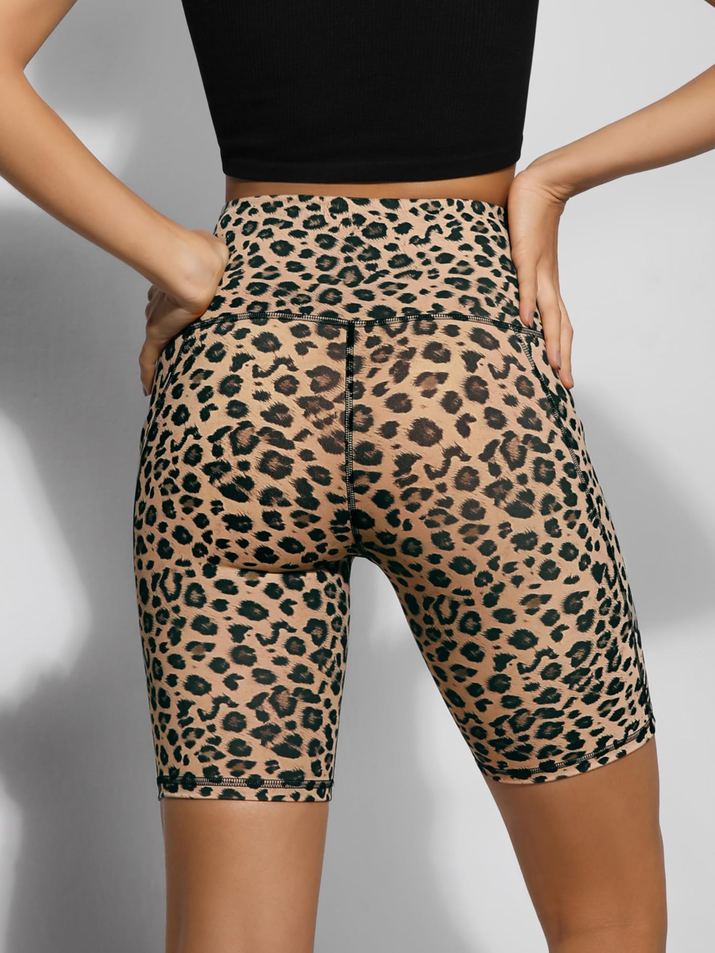 ODODOS 8" Tummy Control Biker Shorts for Women with Pockets High Waist Running Workout Athletic Yoga Shorts, Leopard, Large
