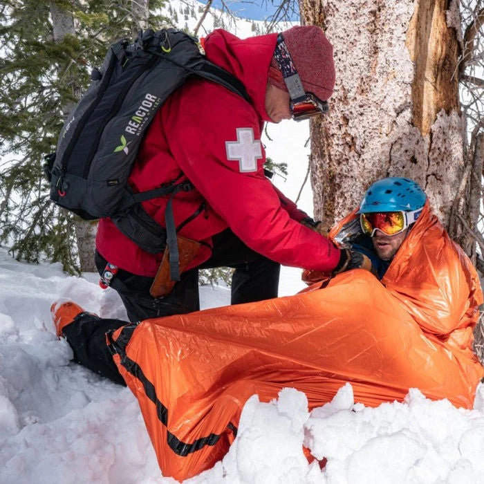 Emergency Thermal Blanket with Rescue Whistle - Waterproof, Windproof & Compact Survival Kit