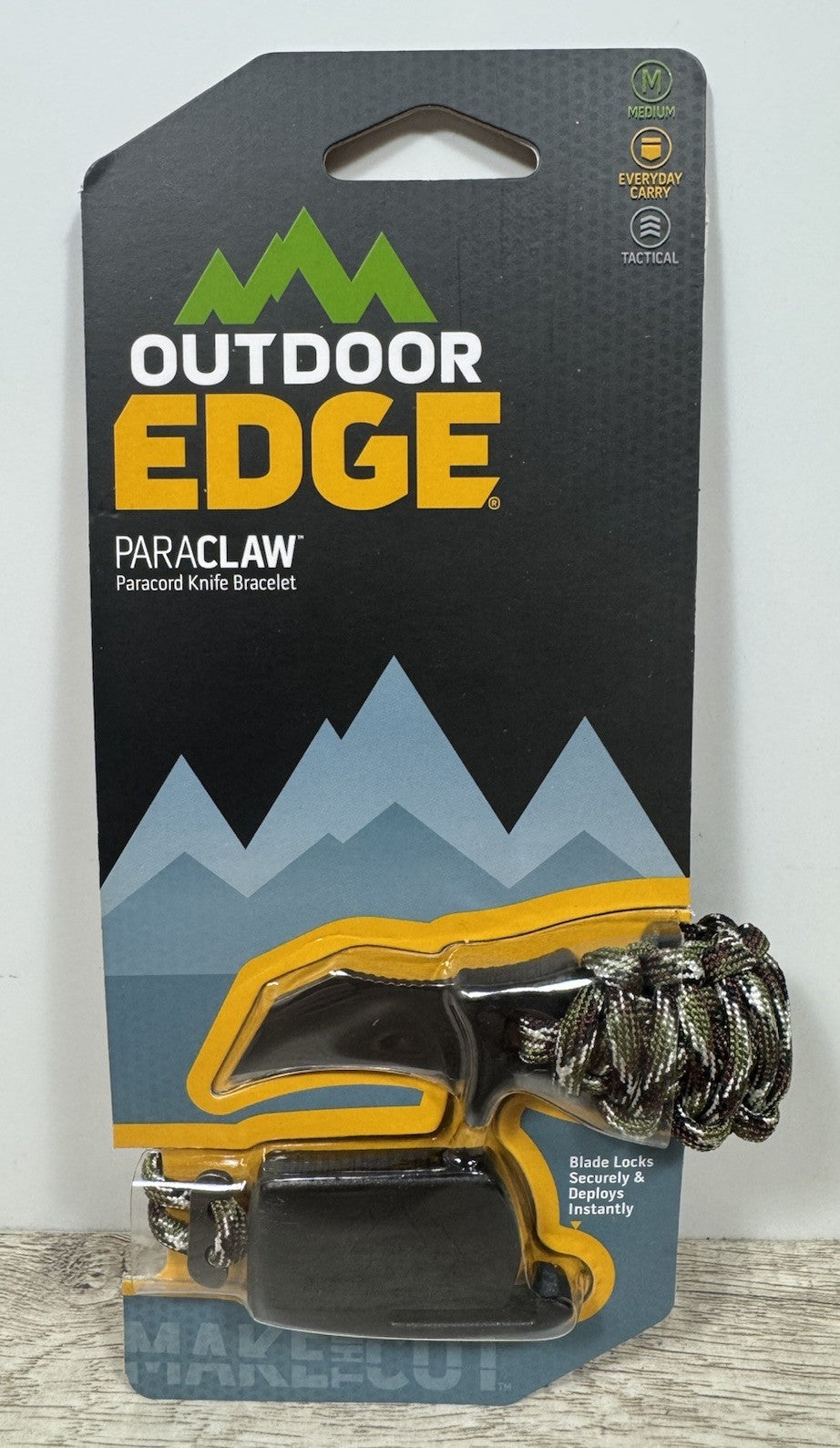 Outdoor Edge Paracord Survival Bracelet with Fixed Blade Knife - Camouflage, Medium
