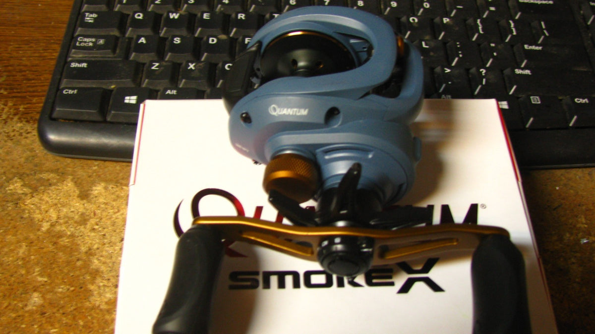 Quantum Smoke Baitcast Reel SMX100HPT - Left Hand, 9 Bearings, 7.3:1 Gear Ratio