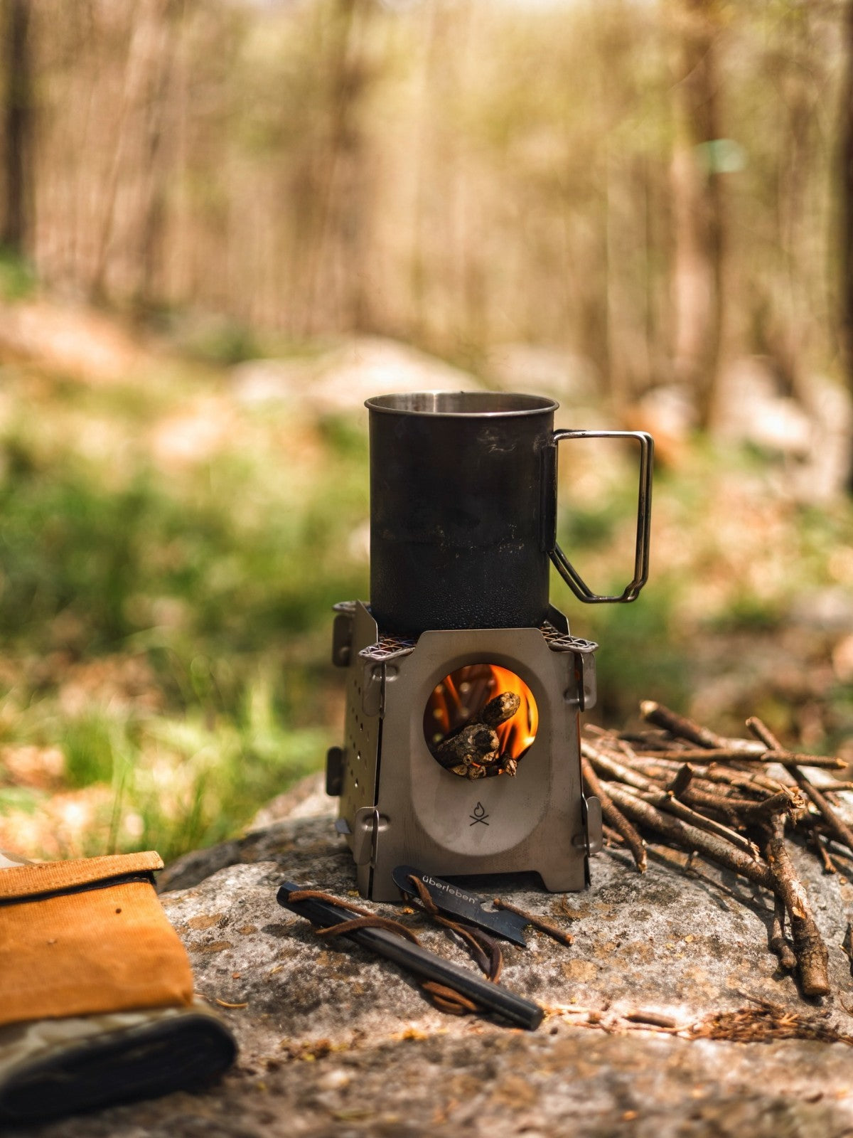 Ultralight Titanium Camping Stove with Flatpack Design and Cooking Grill