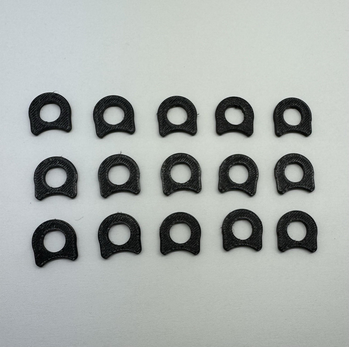 Recoil Shock Reducing Buffer Pad for 1911 Pistols - 15-Pack, Black Rubber, Made in USA