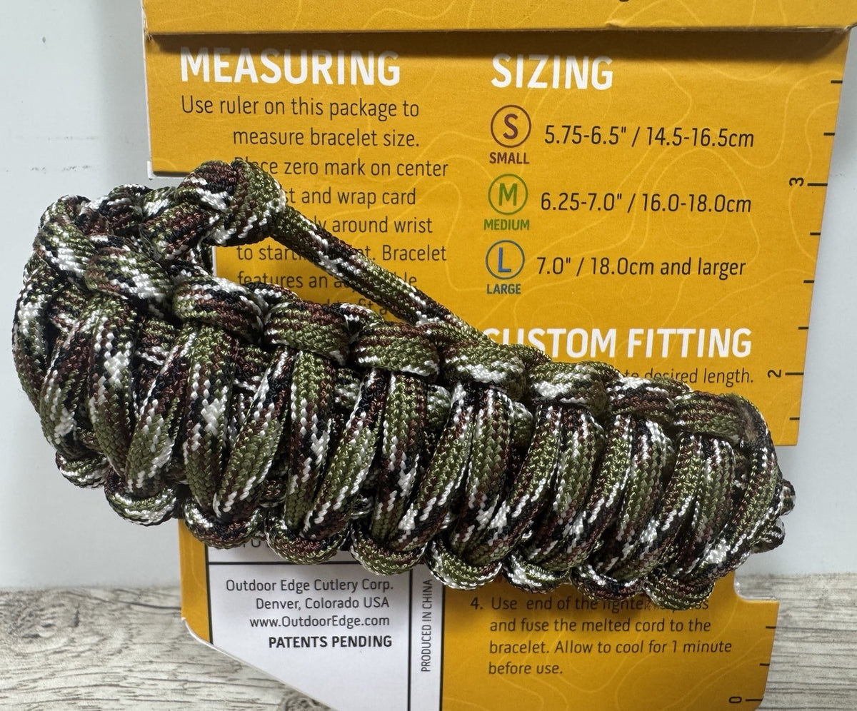 Outdoor Edge Paracord Survival Bracelet with Fixed Blade Knife - Camouflage, Medium