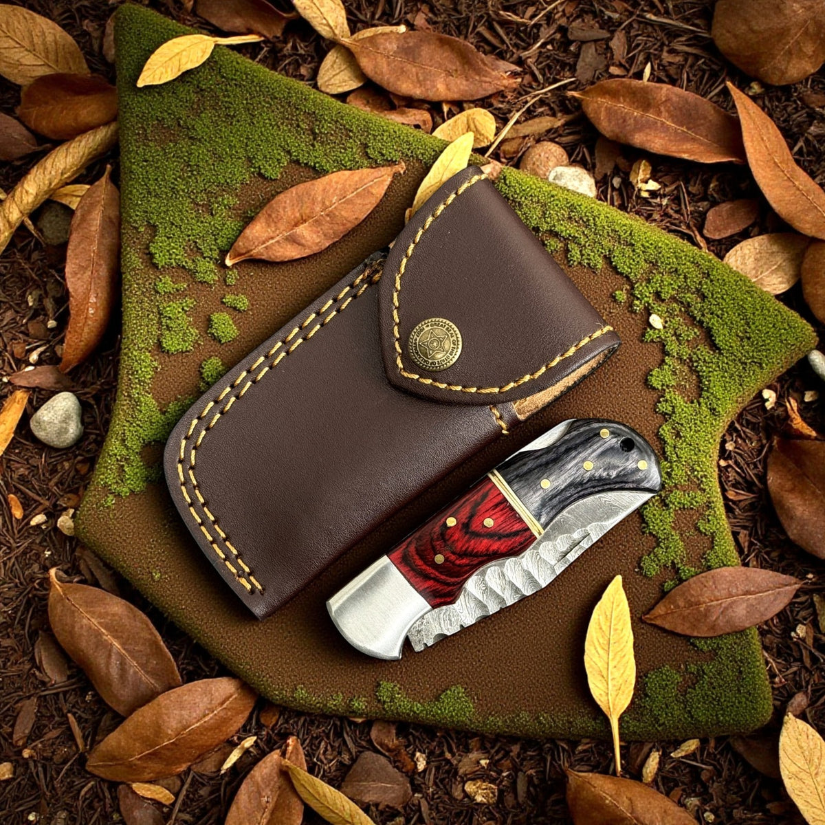 Personalized Damascus Folding Knife with Carved Blade and Leather Sheath
