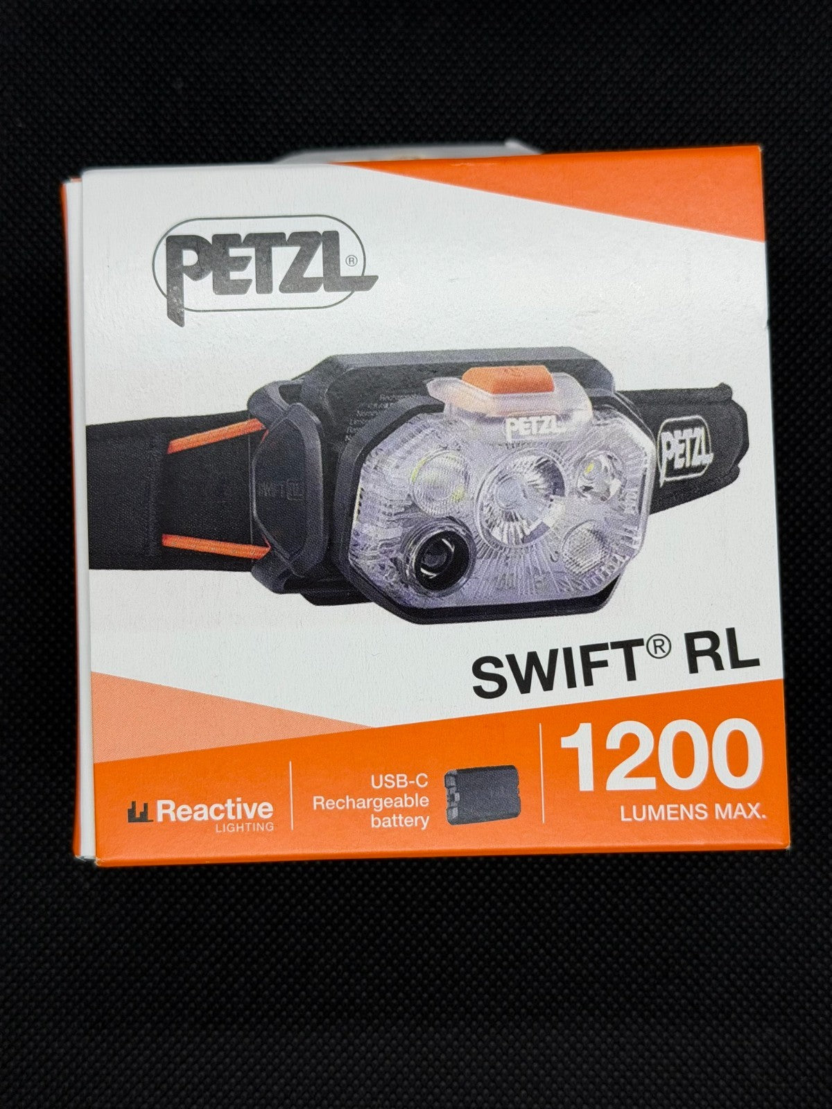 Petzl Swift RL 1200 Lumens Headlamp - Rechargeable, Waterproof, Black/Orange