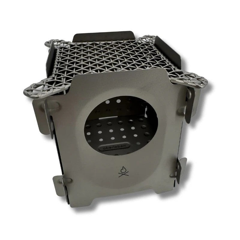 Ultralight Titanium Camping Stove with Flatpack Design and Cooking Grill