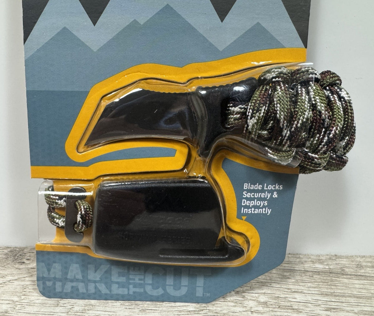 Outdoor Edge Paracord Survival Bracelet with Fixed Blade Knife - Camouflage, Medium